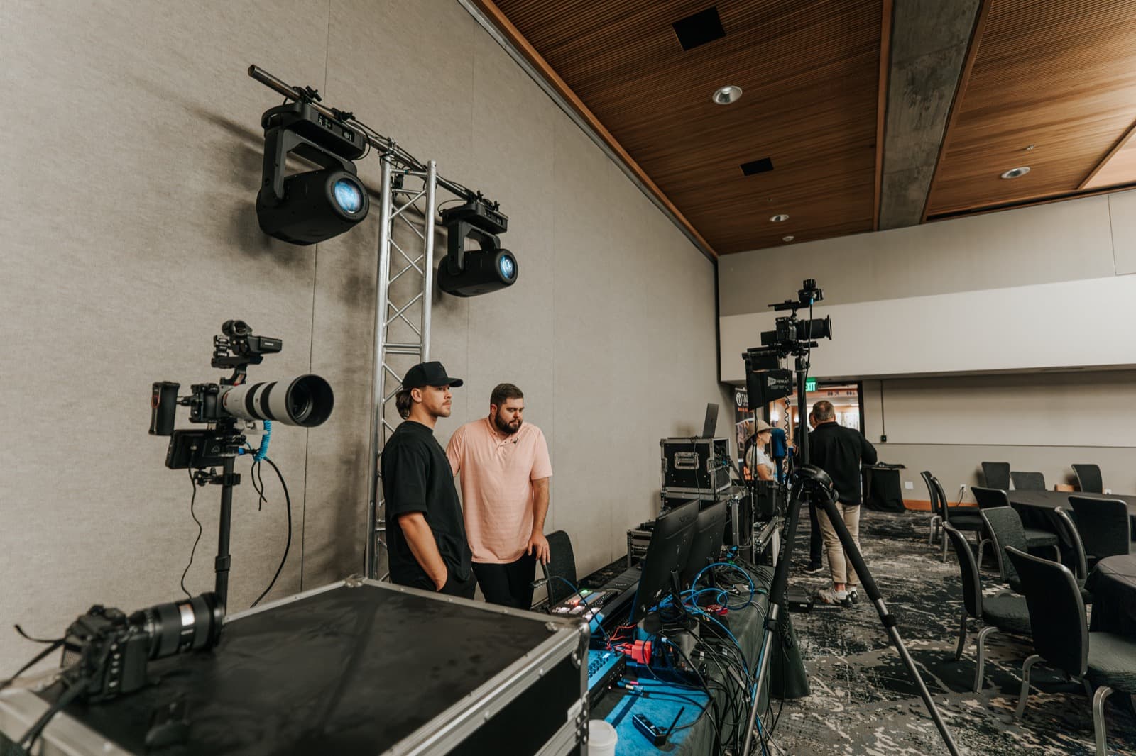 Production camera and lighting setup for the Black Card private event.