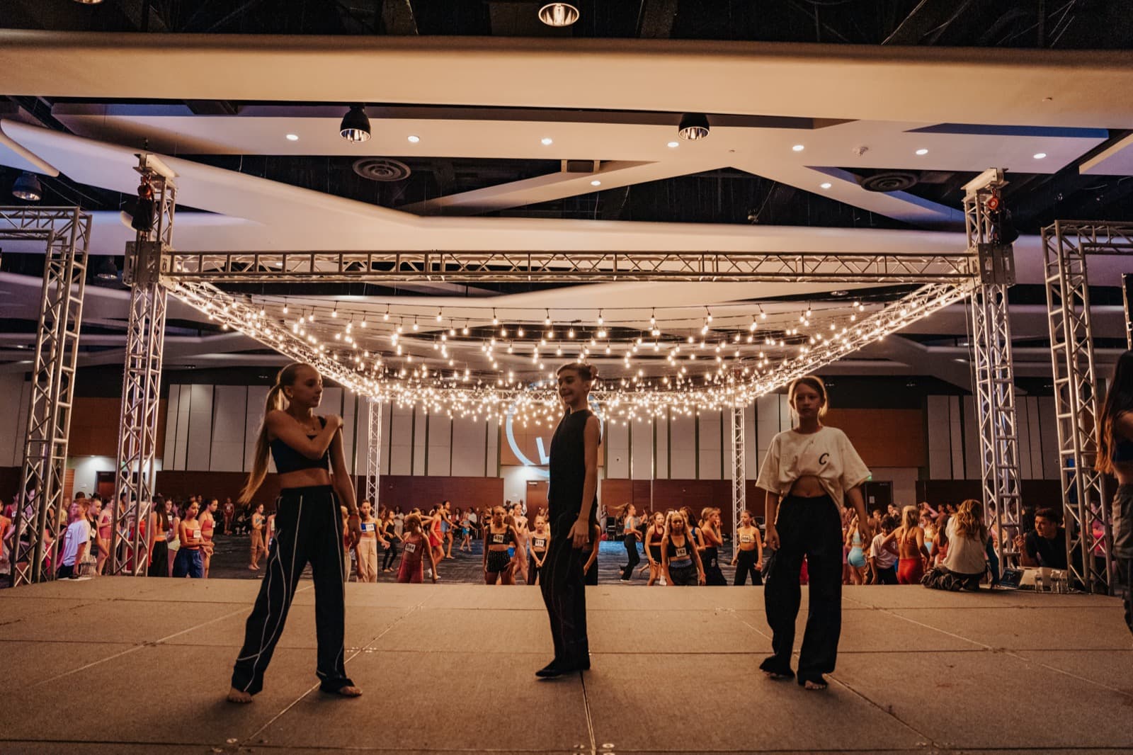 Guests gathered in a lobby or pre-function space for the Five World event.